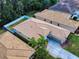 Aerial view of property featuring fenced-in backyard and well-maintained landscaping at 3455 Pegaso Ave, New Smyrna Beach, FL 32168