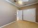 Neutral bedroom features carpet, ample closet space, and a ceiling fan at 3455 Pegaso Ave, New Smyrna Beach, FL 32168