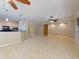 Open-concept layout connecting the living area, kitchen, and entryway, creating a spacious atmosphere at 3455 Pegaso Ave, New Smyrna Beach, FL 32168