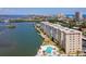 Luxury waterfront condo with a swimming pool, balconies, and stunning city views at 3606 S Peninsula Dr # 812, Port Orange, FL 32127