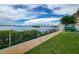 Lush landscaping lines the walkway to the community dock at 3606 S Peninsula Dr # 812, Port Orange, FL 32127