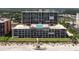 Oceanfront condo building featuring balconies, a pool, and direct beach access at 4139 S Atlantic Ave # A504, New Smyrna Beach, FL 32169