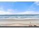View of the beach from balcony with ocean views at 5201 S Atlantic Ave # 708A, New Smyrna Beach, FL 32169