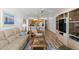 Comfortable living room next to kitchen featuring ocean view at 5201 S Atlantic Ave # 708A, New Smyrna Beach, FL 32169