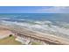 Aerial view of the beach showcasing the sand and the ocean at 5499 Atlantic # 104, New Smyrna Beach, FL 32169