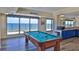 Game room with a pool table and ocean views at 5499 Atlantic # 104, New Smyrna Beach, FL 32169