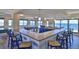 Entertaining recreation room offering bar seating and an ocean view at 5499 Atlantic # 104, New Smyrna Beach, FL 32169