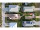 Overhead view of a residential property showcasing the roof, garden, and surrounding neighborhood layout at 6260 S Atlantic Ave, New Smyrna Beach, FL 32169