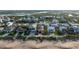 Stunning aerial view of a beachfront home at 6260 South Atlantic Avenue with private beach access at 6260 S Atlantic Ave, New Smyrna Beach, FL 32169