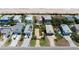 Aerial view of beach homes showcasing beautiful architectural designs and a serene coastal atmosphere at 6260 S Atlantic Ave, New Smyrna Beach, FL 32169