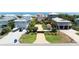 Aerial view of a beach neighborhood with colorful homes at 6260 S Atlantic Ave, New Smyrna Beach, FL 32169