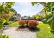 View of backyard and landscaping with house in the background at 6260 S Atlantic Ave, New Smyrna Beach, FL 32169