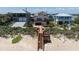 Aerial view of the beach access leading up to a single Gathering home at 6260 S Atlantic Ave, New Smyrna Beach, FL 32169