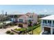Charming two-story home with an attached garage, balconies, and manicured landscaping in a desirable neighborhood at 6260 S Atlantic Ave, New Smyrna Beach, FL 32169