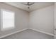 Cozy bedroom with a ceiling fan and ample natural light at 6277 W Fallsgrove Ln, Port Orange, FL 32128