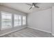 Bright bedroom with plantation shutters and plush carpeting at 6277 W Fallsgrove Ln, Port Orange, FL 32128