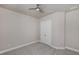 Neutral bedroom design featuring a ceiling fan and closet at 6277 W Fallsgrove Ln, Port Orange, FL 32128