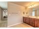 This bathroom boasts double vanities and a walk-in shower creating a functional and stylish space at 6950 Vintage Ln, Port Orange, FL 32128