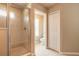 Bright bathroom with a glass-enclosed shower and separate toilet room ensures privacy and convenience at 6950 Vintage Ln, Port Orange, FL 32128