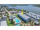Coastal condo community featuring a pool and waterfront views at 845 Ladyfish Ave # B204, New Smyrna Beach, FL 32169