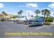 Community parking lot with boats and trailers at 845 Ladyfish Ave # B204, New Smyrna Beach, FL 32169