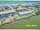 Exterior view of condos nestled between the ocean and Indian River at Bethune Beach, offering coastal living at 845 Ladyfish Ave # B204, New Smyrna Beach, FL 32169