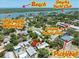 Aerial view showcases proximity to Smyrna Yacht Club, Intracoastal Waterway, and Live Oak Cultural Center at 913 Palmetto St, New Smyrna Beach, FL 32168