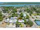 Beautiful waterfront community featuring lush green landscaping and serene water views from above at 913 Palmetto St, New Smyrna Beach, FL 32168