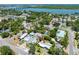 Aerial view of the property showcasing the home, landscaping and neighborhood at 913 Palmetto St, New Smyrna Beach, FL 32168