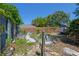View of backyard with raised garden beds and a variety of plants at 913 Palmetto St, New Smyrna Beach, FL 32168