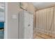 Neutral bathroom featuring stylish cabinet and a patterned shower curtain at 913 Palmetto St, New Smyrna Beach, FL 32168