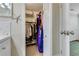 Walk-in closet featuring organized clothing and shelving at 913 Palmetto St, New Smyrna Beach, FL 32168