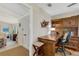 Lovely home office with wood desk and built-in shelving at 913 Palmetto St, New Smyrna Beach, FL 32168