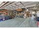 Bright shed interior, equipped with shelving and workspace for storage at 913 Palmetto St, New Smyrna Beach, FL 32168