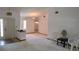 View of the home's interior, showcasing the wide living area and partial view of the main entrance at 1077 Willow Wood Dr, Port Orange, FL 32129