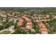 Lovely aerial shot showing the neighborhood's mature trees, and sidewalks in a desirable area at 11222 Rapallo Ln, Windermere, FL 34786