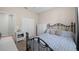 Comfortable bedroom featuring a window, closet, and soft lighting, with views to other rooms at 11222 Rapallo Ln, Windermere, FL 34786