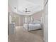 Spacious main bedroom with a tray ceiling, sitting area, walk-in closet, and ensuite bathroom at 11222 Rapallo Ln, Windermere, FL 34786