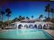 Resort-style swimming pool with lounge chairs, offering a relaxing and luxurious outdoor experience at 11222 Rapallo Ln, Windermere, FL 34786