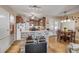 Kitchen area with a wine rack, wooden cabinets, and a dining nook at 115 Los Arbor Dr, Deland, FL 32724