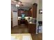 Well-equipped kitchen with stainless steel appliances, granite countertops, and ample cabinet space, perfect for cooking at 115 Los Arbor Dr, Deland, FL 32724
