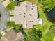 Overhead view of a lovely home with a beautiful roof and picturesque pond in the backyard at 116 Duck Hawk Cir # 3040, Daytona Beach, FL 32119
