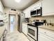 Bright kitchen with stainless steel appliances and plenty of counter space at 116 Duck Hawk Cir # 3040, Daytona Beach, FL 32119