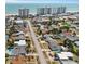 Aerial view showcasing neighborhood, proximity to the beach and nearby high-rise buildings at 13 Essex Dr, Ormond Beach, FL 32176