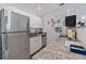 Modern kitchen featuring stainless steel appliances, white cabinetry, and light countertops at 13 Essex Dr, Ormond Beach, FL 32176