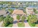 Aerial view of a beautiful house with waterfront access and lush landscaping at 133 Via Capri, New Smyrna Beach, FL 32169