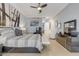 Stylish bedroom showcasing sleek furniture, elegant decor, and ample natural light at 133 Via Capri, New Smyrna Beach, FL 32169