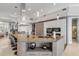Spacious kitchen island with breakfast bar, modern hood and stainless appliances at 133 Via Capri, New Smyrna Beach, FL 32169