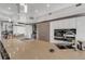 Modern kitchen island with cooktop, stainless hood and appliances, plus seating at 133 Via Capri, New Smyrna Beach, FL 32169