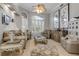 Inviting living room offering detailed decor, bright lighting and stylish furnishings at 133 Via Capri, New Smyrna Beach, FL 32169
